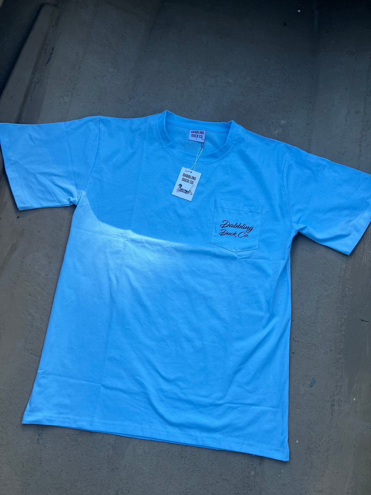 Loaded timber pocket tee